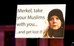 angela-merkel-to-pay-millions-muslim-migrants-voluntarily-leave-germany-isis-298x186.jpg